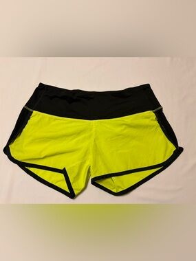 Lululemon Speed Up Shorts in the color Antidote Neon